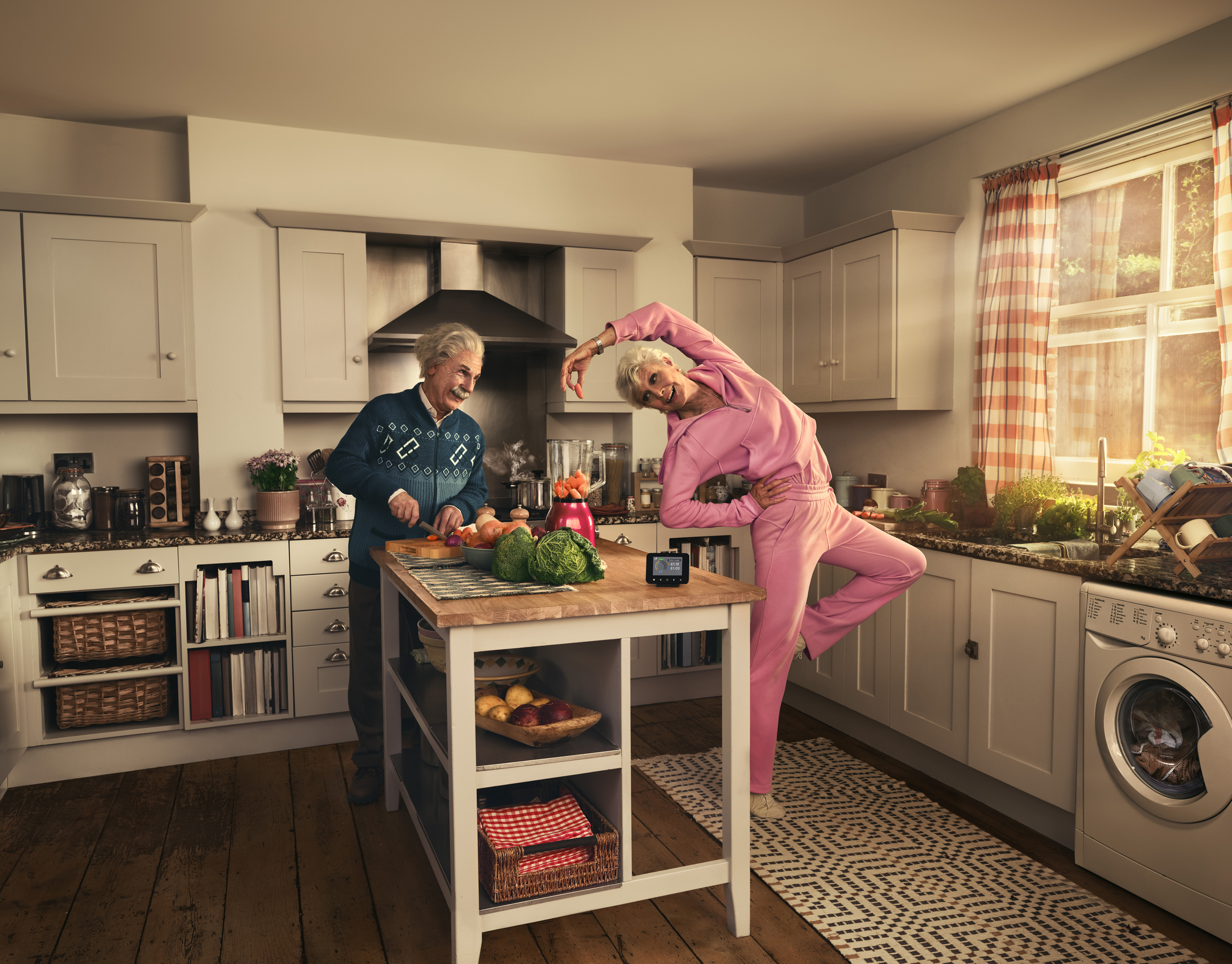 Albert Einstein and Angela Rippon in a kitchen, making a smoothie.